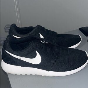 Nike running shoes. Size women’s US9.